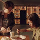 A scene from the movie Parasite, where the main character is eating a bowl of Chapaguri