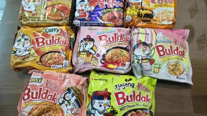 A series of viral Buldak ramen on a table with different flavors