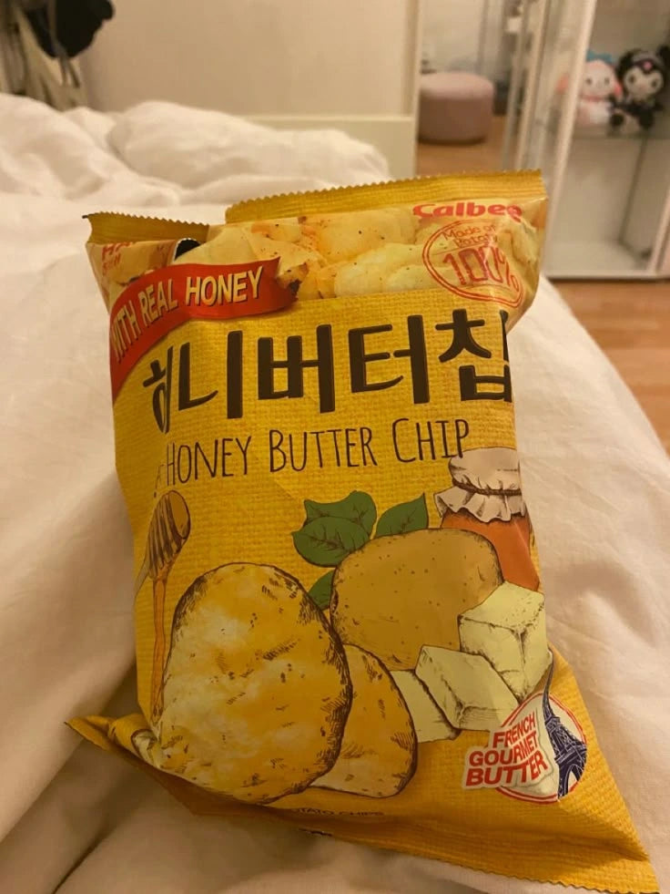 Packaged honey butter chips with Calbee branding on a white surface.